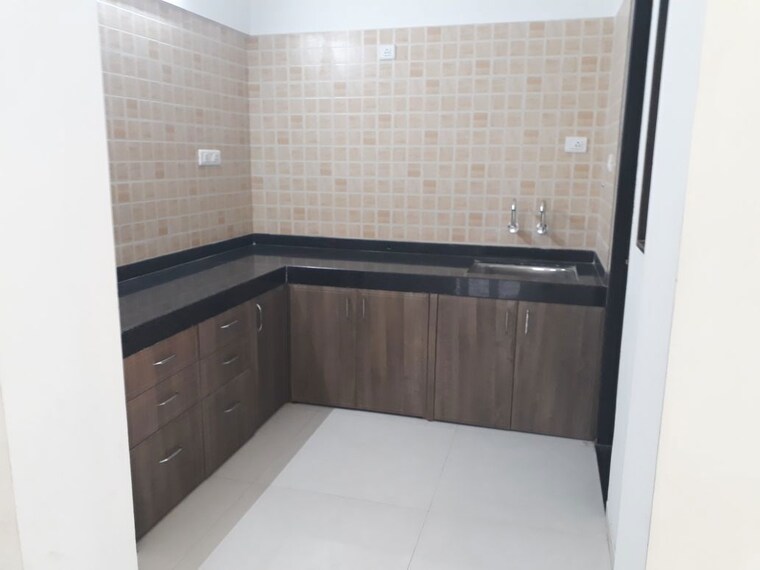 Kitchen, shlok-chs-moshi 2 Bedroom 723 Sq.Ft. Apartment In Moshi Pune 10530516