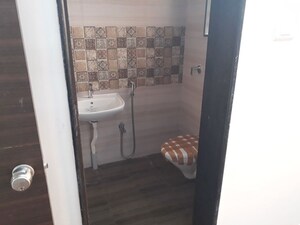 Bathroom in 2 BHK Apartment at Shlok CHS Moshi, Moshi – for Rent