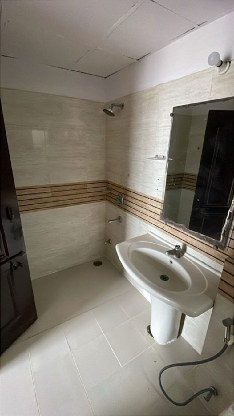 Bathroom, amrapali-zodiac 2 Bedroom 950 Sq.Ft. Apartment In Sector 120 Noida 10530509