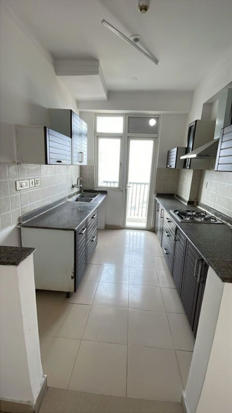 Kitchen, amrapali-zodiac 2 Bedroom 950 Sq.Ft. Apartment In Sector 120 Noida 10530509