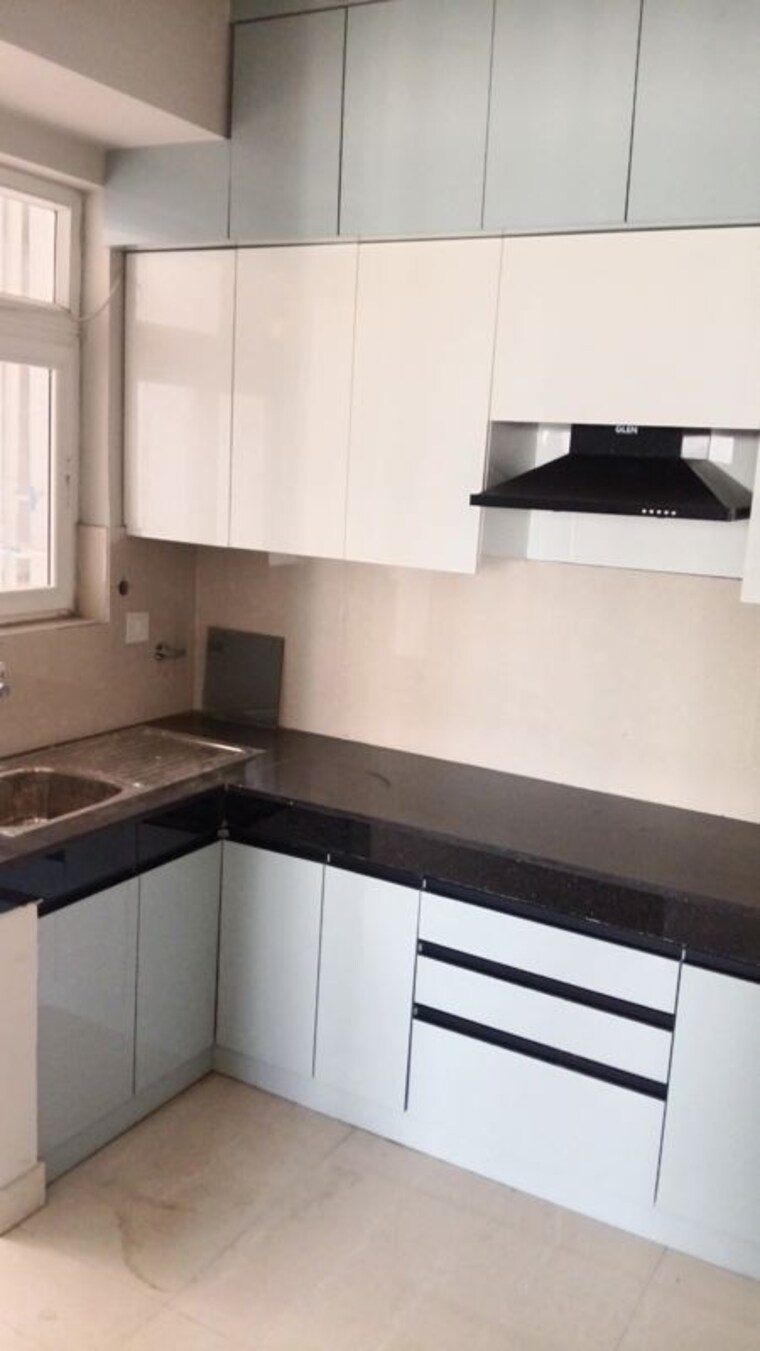 Kitchen, eldeco-live-by-the-greens 3 Bedroom 1404 Sq.Ft. Apartment In Sector 150 Noida 10530524