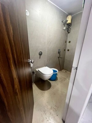 Bathroom in 1 BHK Apartment at Vakratund Tower, Naupada – for Rent