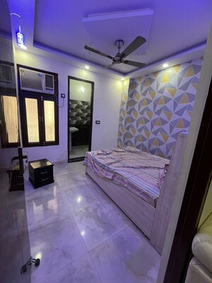 Bedroom in 2 BHK Builder Floor at Dwarka Mor – for Rent
