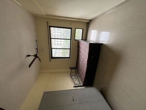 Living Room in 1 BHK Apartment at Cosmos Heritage, Manpada – for Rent