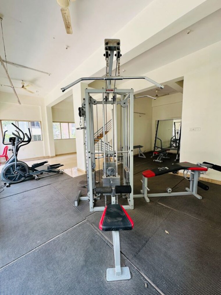 Gym, whistling-winds 2 Bedroom 781 Sq.Ft. Apartment In Pisoli Pune 10513088