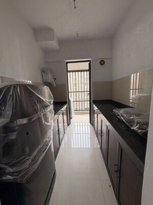 Kitchen in 1 BHK Apartment at Lodha Palava City Lakeshore Greens, Dombivli East – for Rent