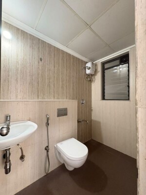 Bathroom in 1 BHK Apartment at Lodha Palava City Lakeshore Greens, Dombivli East – for Rent