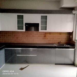 Kitchen in 2 BHK Apartment at Mahagun Mywoods, Sector 16c Greater Noida – for Rent