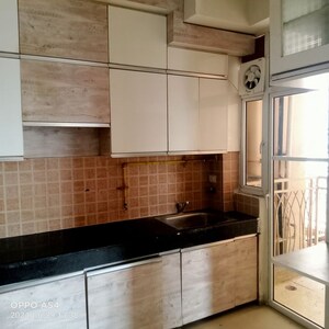 Kitchen in 2.5 BHK Apartment at Mahagun Mywoods, Sector 16c Greater Noida – for Rent