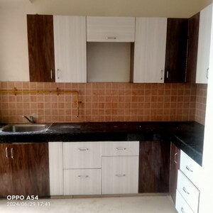 Kitchen in 2.5 BHK Apartment at Mahagun Mywoods, Sector 16c Greater Noida – for Rent