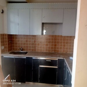 Kitchen in 4 BHK Apartment at Mahagun Mywoods, Sector 16c Greater Noida – for Rent