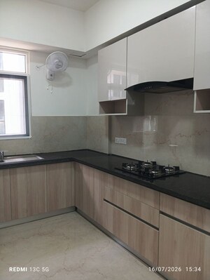 Kitchen in 2 BHK Apartment at Smart World Orchard, Sector 61 – for Rent