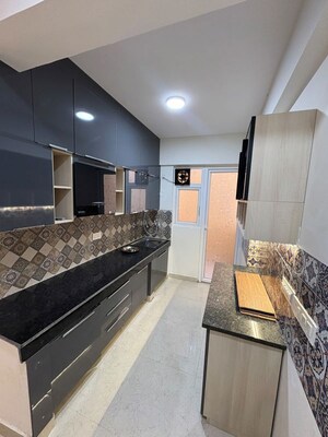 Kitchen in 2.5 BHK Apartment at Signature The Millennia 3, Sector 37d – for Rent