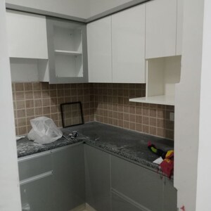 Kitchen in 2.5 BHK Apartment at Mahagun Mywoods, Sector 16c Greater Noida – for Rent