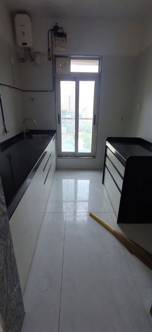Kitchen in 2.5 BHK Apartment at Bharat Arize, Goregaon West – for Rent