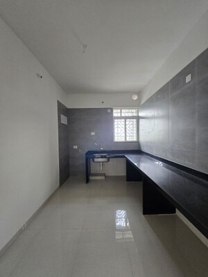Kitchen in 2 BHK Apartment at Rama Fusion Towers, Hinjewadi – for Rent
