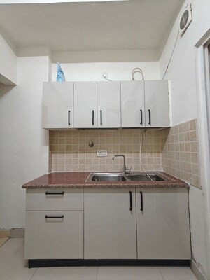 Kitchen in 3 BHK Apartment at JM Aroma, Sector 75 – for Rent