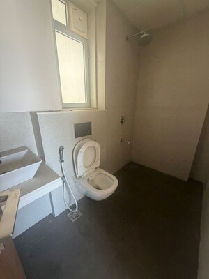 Bathroom in 2 BHK Apartment at Piramal Vaikunth A Class Homes, Balkum Pada – for Rent