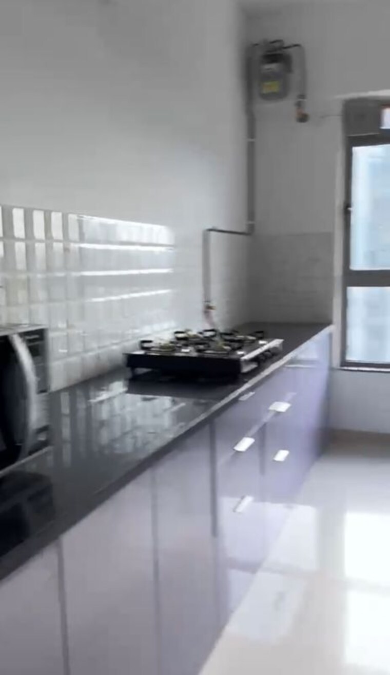 Kitchen, kalpataru-immensa 2 Bedroom 950 Sq.Ft. Apartment In Kolshet Road Thane 10531160