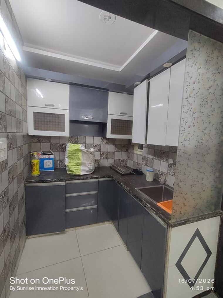 Kitchen, mansa ram park 3 Bedroom 85 Sq.Yd. Builder Floor In Mansa Ram Park Delhi 10533647