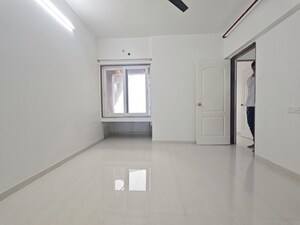 Building Lobby in 2 BHK Apartment at Arihant Aspire, Palaspe Phata – for Rent