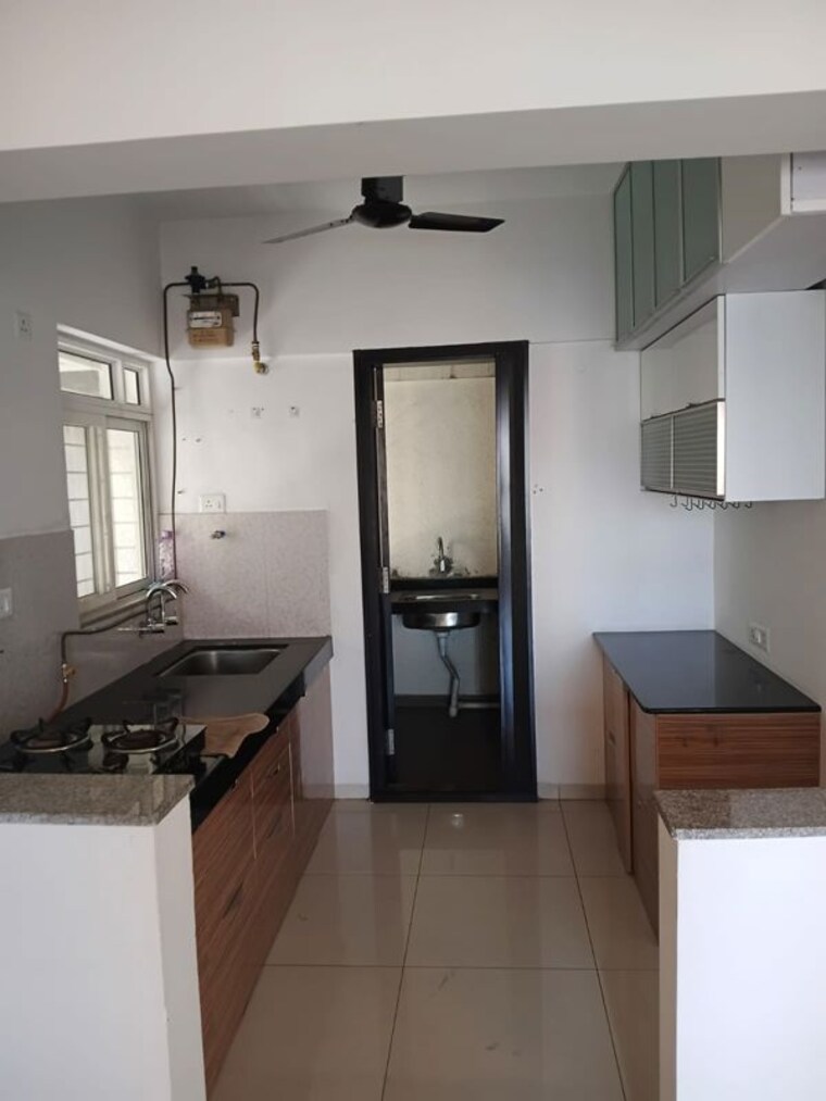 Kitchen, kolte-patil-western-avenue 2 Bedroom 780 Sq.Ft. Apartment In Wakad Pune 10533732