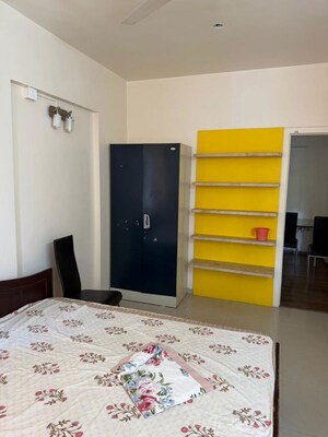Bedroom in 2 BHK Apartment at Rachana Belvedere Apartment, Aundh – for Rent