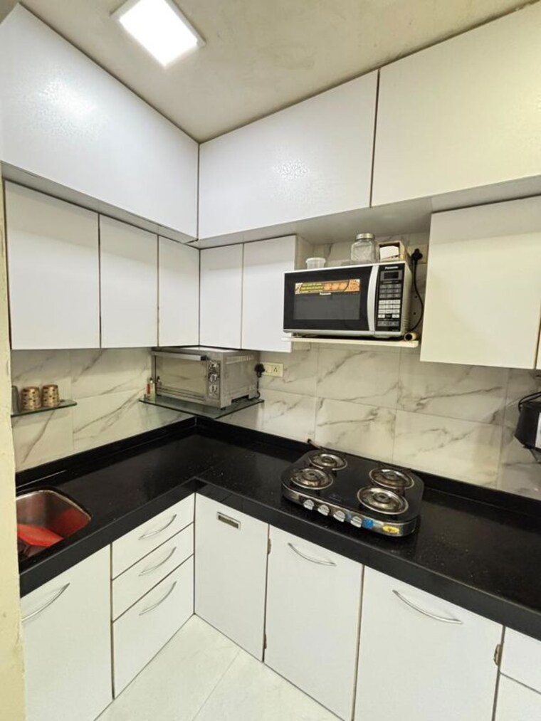 Kitchen, olympia-tower 2.5 Bedroom 750 Sq.Ft. Apartment In Jacob Circle Mumbai 10533801