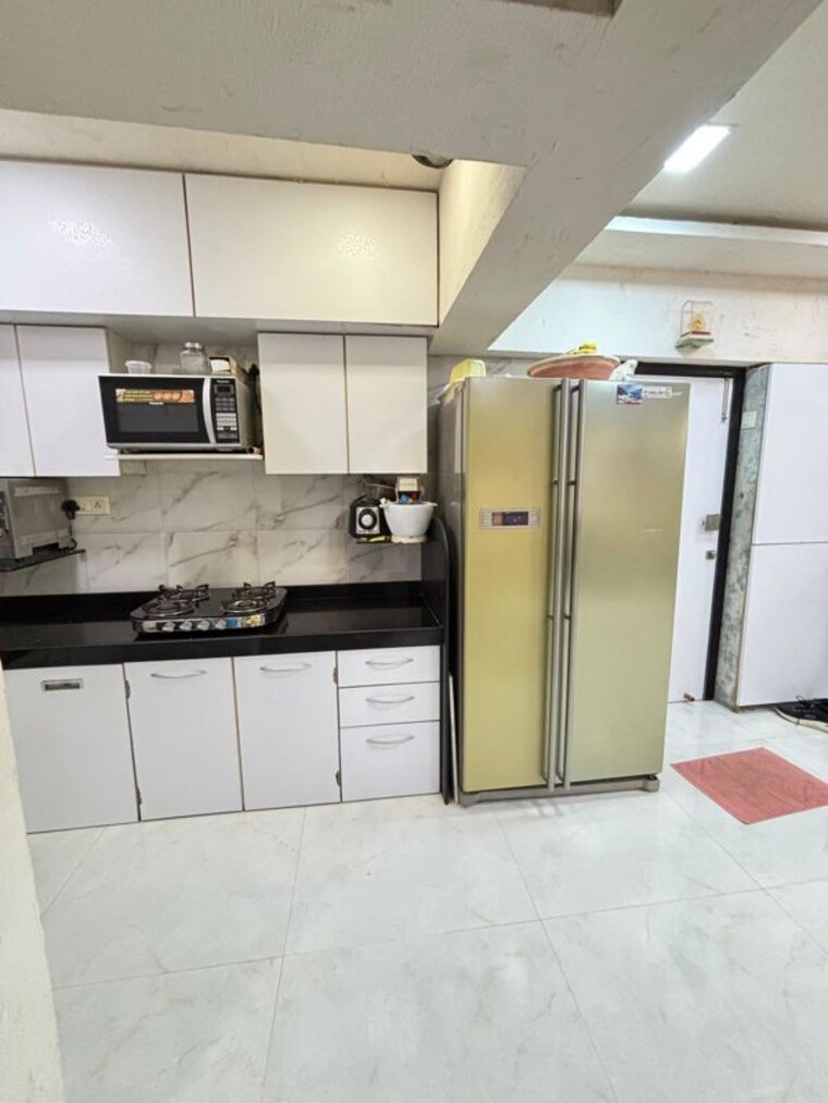 Kitchen, olympia-tower 2.5 Bedroom 750 Sq.Ft. Apartment In Jacob Circle Mumbai 10533801