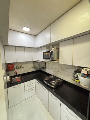 Kitchen in 2.5 BHK Apartment at Olympia Tower, Jacob Circle – for Rent
