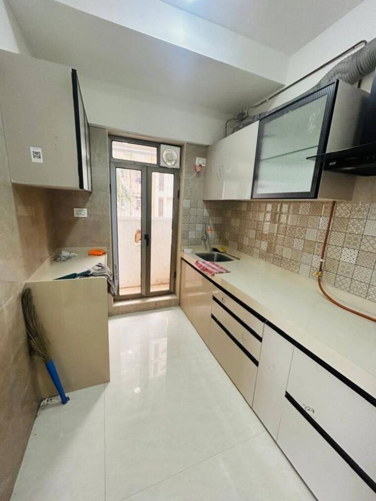 Kitchen, mk-gracia 2 Bedroom 665 Sq.Ft. Apartment In Amboli Mumbai 10533823