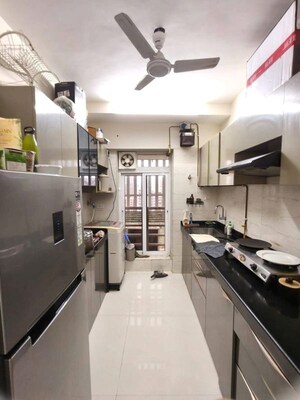 Kitchen in 2 BHK Apartment at Romell Amore, Andheri West – for Rent