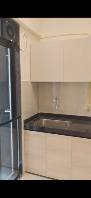 Bathroom in 2 BHK Apartment at Our Home CHS, Andheri West – for Rent
