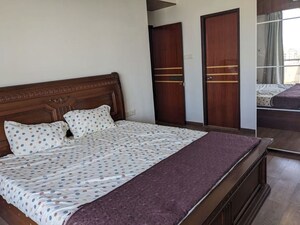 Bedroom in 3 BHK Apartment at Shimmering Heights, Mahim West – for Rent