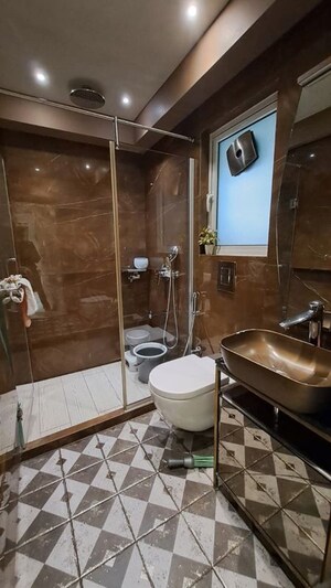 Bathroom in 3 BHK Apartment at Gulmohar Road – for Rent