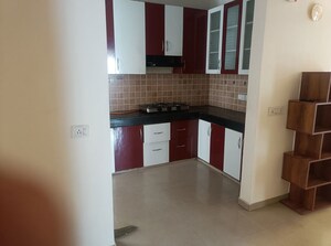 Kitchen in 2 BHK Apartment at Mahagun My Woods, Sector 16c Greater Noida – for Rent