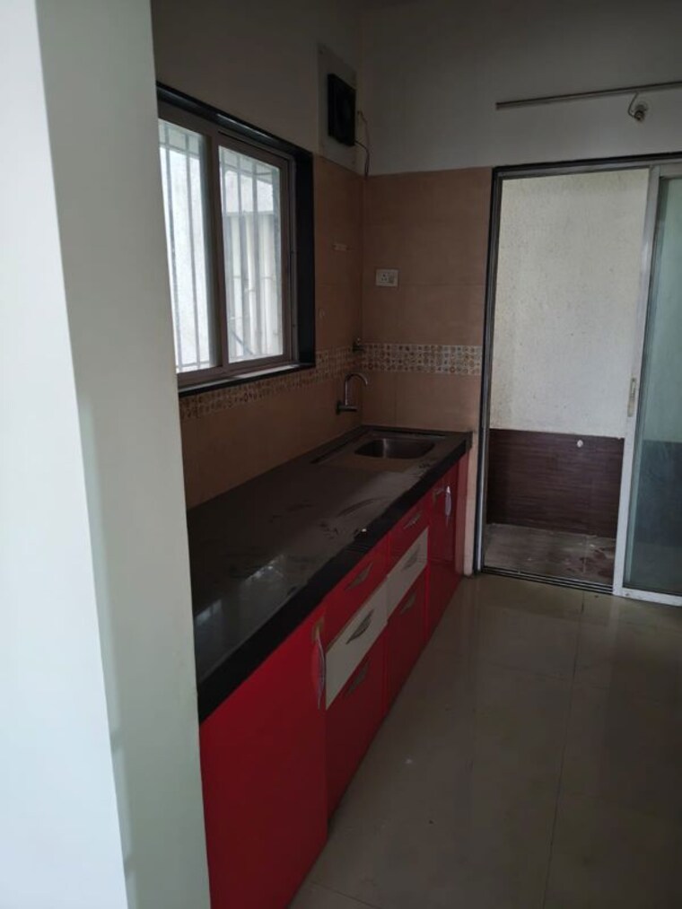 Kitchen, rama-celestial-city-phase-ii 2 Bedroom 950 Sq.Ft. Apartment In Ravet Pune 10534054