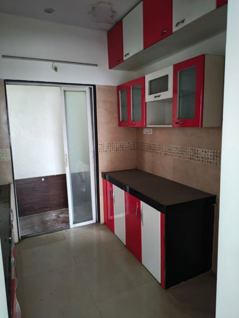 Kitchen, rama-celestial-city-phase-ii 2 Bedroom 950 Sq.Ft. Apartment In Ravet Pune 10534054
