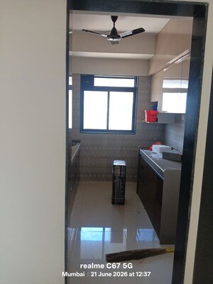 Kitchen in 2 BHK Apartment at Sarthak Amrut Tara, Andheri West – for Rent