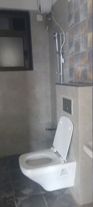 Bathroom in 2 BHK Apartment at Naman Habitat, Andheri West – for Sale