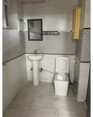 Bathroom in 3 BHK Apartment at Dwarka – for Rent