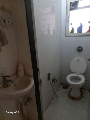 Bathroom in 1 BHK Apartment at Cosmos Hilton, Patlipada – for Sale