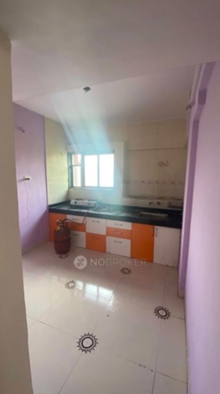 Kitchen, guru-ganesh-housing-society 2 Bedroom 850 Sq.Ft. Apartment In Katraj Pune 10534238