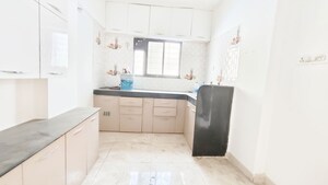 Kitchen in 1 BHK Apartment at Pratham Residency, Wadgaon Sheri – for Rent