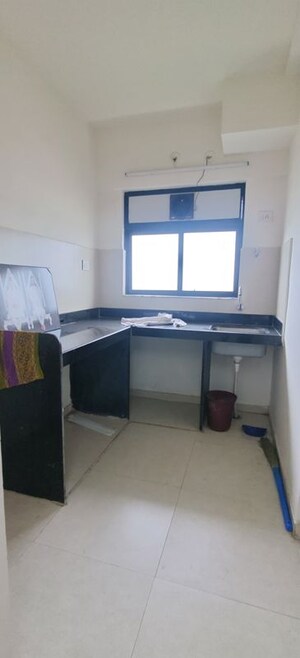 Kitchen in 2 BHK Apartment at Runwal Gardens North Avenue, Dombivli East – for Rent