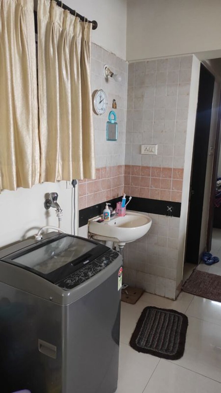 Washroom, magarpatta-city-zinnia 1 Bedroom 800 Sq.Ft. Apartment In Hadapsar Pune 10534329