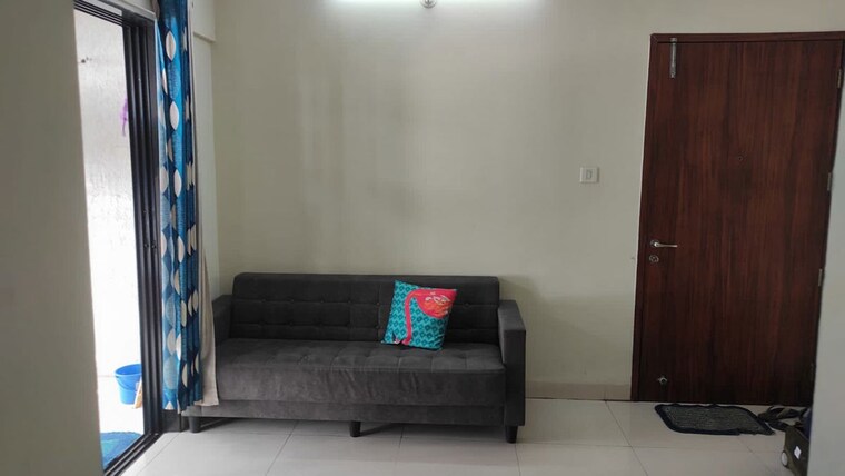 Living Room, magarpatta-city-zinnia 1 Bedroom 800 Sq.Ft. Apartment In Hadapsar Pune 10534329