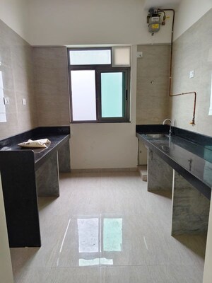 Kitchen in 2 BHK Apartment at Sheth Auris Serenity Tower 3, Malad West – for Rent