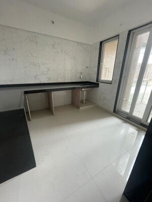 Kitchen in 3 BHK Apartment at Divine Palm Springs, Wakad – for Sale
