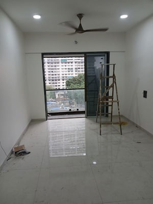 Room in 2 BHK Apartment at Lodha Woods, Kandivali East – for Sale